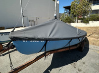 Lido 14 Sailboat Mast Up Peaked Cover made in America by SLO Sail and Canvas. Shown In Polyester Charcoal Gray with optional upgrade: STRAPS. 