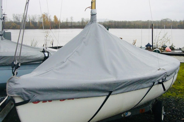 Lido 14 Sailboat Mast Up Peaked Cover made in America by SLO Sail and Canvas. Shown In Top Gun Sea Gull Gray with optional upgrade: STRAPS. 