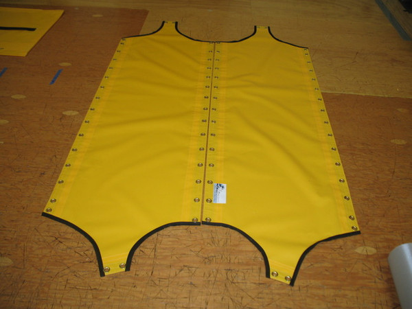 Vinyl Wing Trampolines to fit a Hobie® 18 Magnum catamaran made in America by skilled artisans at SLO Sail and Canvas. Shown in 22oz yellow Vinyl.


