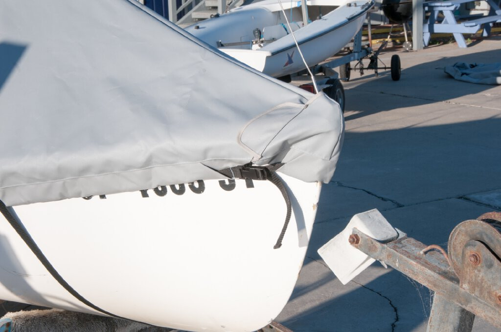 A mast collar and perfectly placed shroud cutouts fit tightly around your boat’s rigging. 