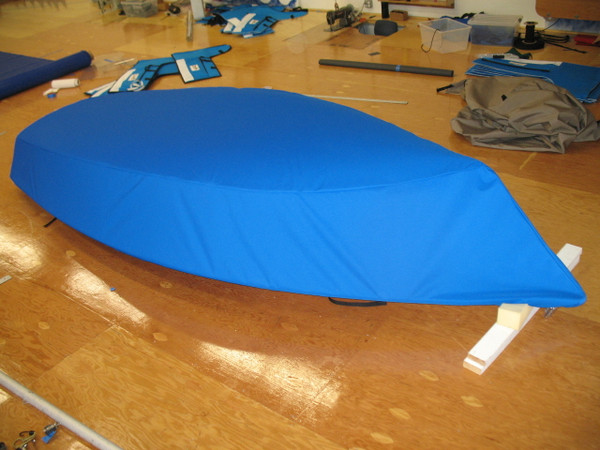 Sailboat Hull Cover made in America by skilled artisans at SLO Sail and Canvas. Cover shown in Polyester Royal Blue. Available in 4 fabrics and many color choices.
