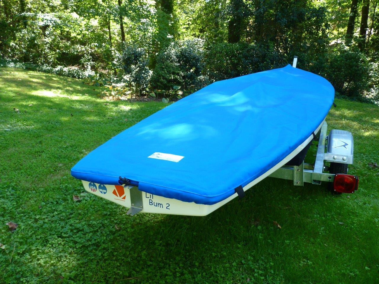 Sailboat Top Deck Cover by SLO Sail and Canvas. Shown in Polyester Royal Blue. 