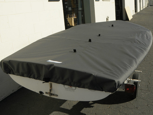 Buy a Top Deck Cover for a JY14 dinghy from SLO Sail and Canvas to keep dirt and debris out of your sailboat during towing and storage. 