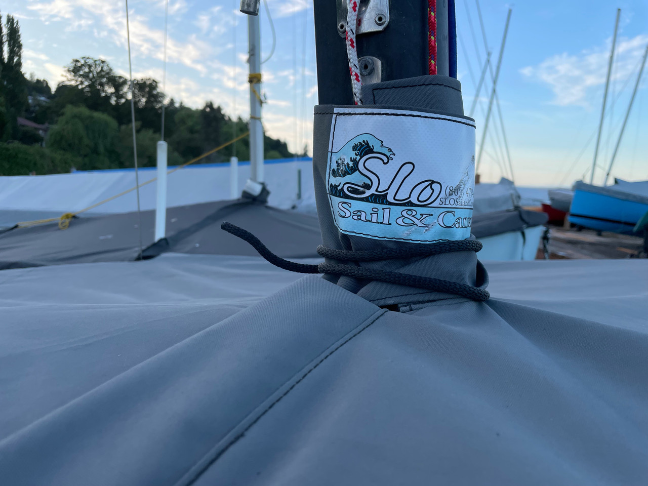 A mast collar and perfectly placed shroud cutouts fit tightly around your boats rigging. 
