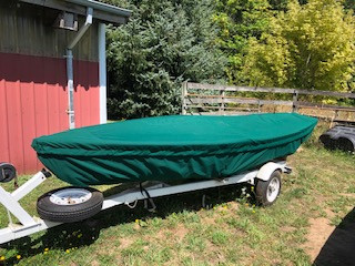 Snipe Sailboat Skirted Top Cover made in America by skilled artisans at SLO Sail and Canvas. Cover shown in Sunbrella Forest Green. Available in 3 fabrics and many color choices.
