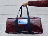 Sailcloth Duffel Bag Medium - Limited Edition. Made in the USA by SLO Sail and Canvas with upcycled Dimension Polyant injection laminated sailcloth. Shown in purple.