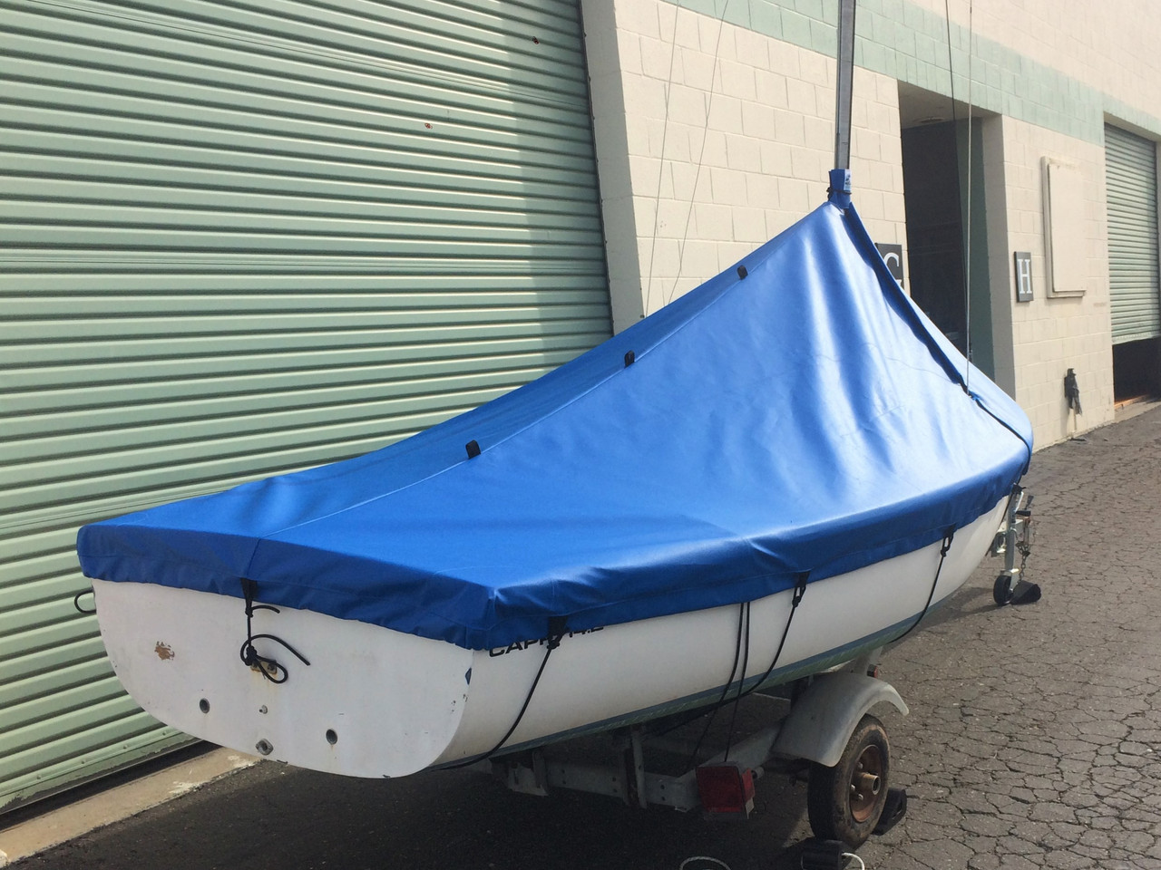A Mast Up Peaked Cover from SLO Sail and Canvas will shed water and debris - keeping your Capri 14.2 by Catalina clean and ready to sail in minutes.