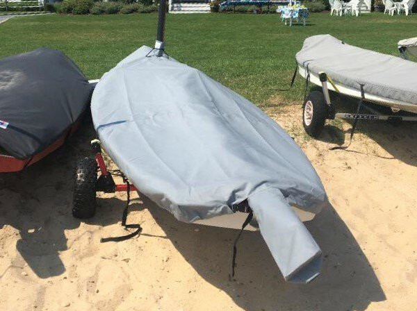 Pointer 14 Sailboat Hull Cover made in America by skilled artisans at SLO Sail and Canvas. Cover shown in Polyester Charcoal Gray. Available in 3 fabrics and many color choices.


