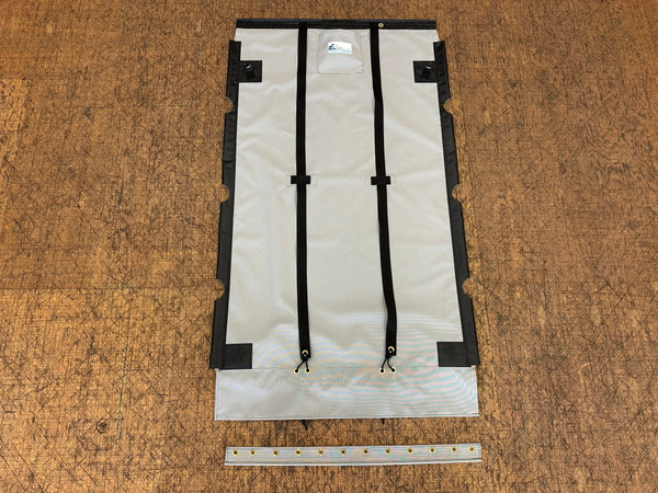 Dusk Grey Textilene 90 Mesh Trampoline to fit a Hobie® catamaran made in America by skilled artisans at SLO Sail and Canvas. Hand pounded #4 brass spur grommets. Adjustable hiking straps made of 3” Polypropylene webbing. 12” X 12” Halyard pocket, included. Built-in aft line catcher, included. 