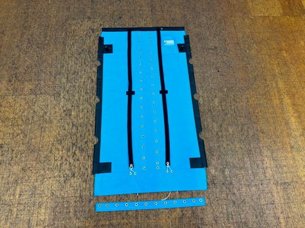 Trampoline with Centerlace to fit a Hobie® Wave Classic catamaran made in America by skilled artisans at SLO Sail and Canvas. Shown in Textilene 90 Lake Blue.