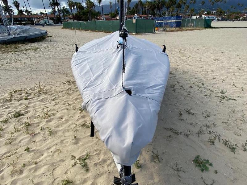 A mast collar and perfectly placed shroud cutouts fit tightly around your boat’s rigging. 
