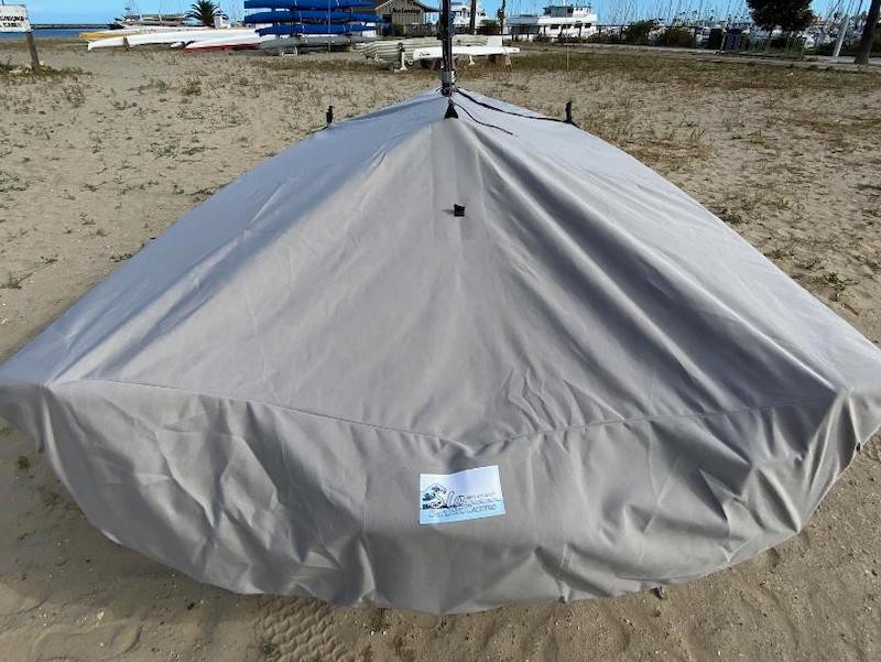 Reinforcements positioned over blocks and cleats prevent chafing. Webbing loops are sewn around the perimeter of our top covers allowing your cover to be tied to your boat. 
