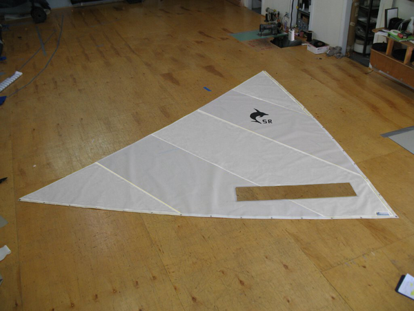Dolphin Sr. White Dacron Sail made in the USA by SLO Sail and Canvas from high quality 4oz. Dacron sailcloth. 