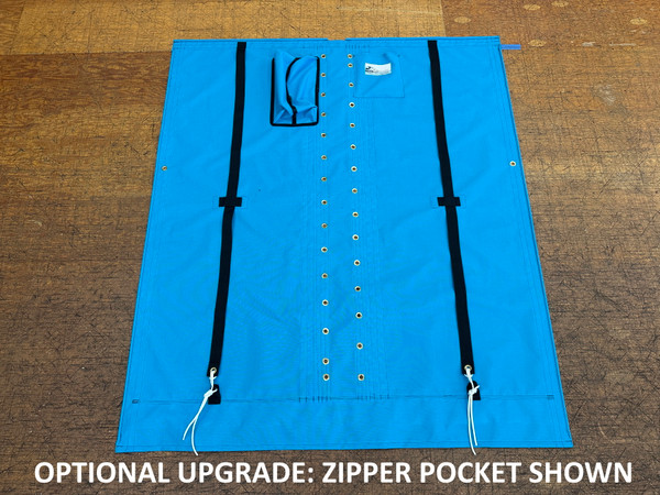 Nacra 5.8 catamaran trampoline with center lace. Made in America by skilled artisans at SLO Sail and Canvas. Adjustable hiking straps made of 3” Polypropylene webbing. Built-in aft line catcher, included. Hand pounded #4 brass spur grommets. 12” X 12” halyard pocket, included. 