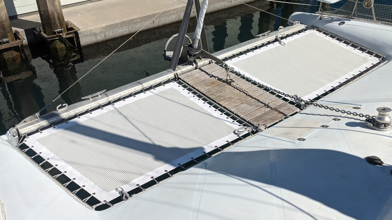 Wildcat 350 MK.III cruising catamaran 2 piece trampoline set made by skilled artisans in the USA at SLO Sail and Canvas. Constructed from top-notch Ferrari 492 architectural grade mesh, with your choice of grommets, and your choice of thread type. 
