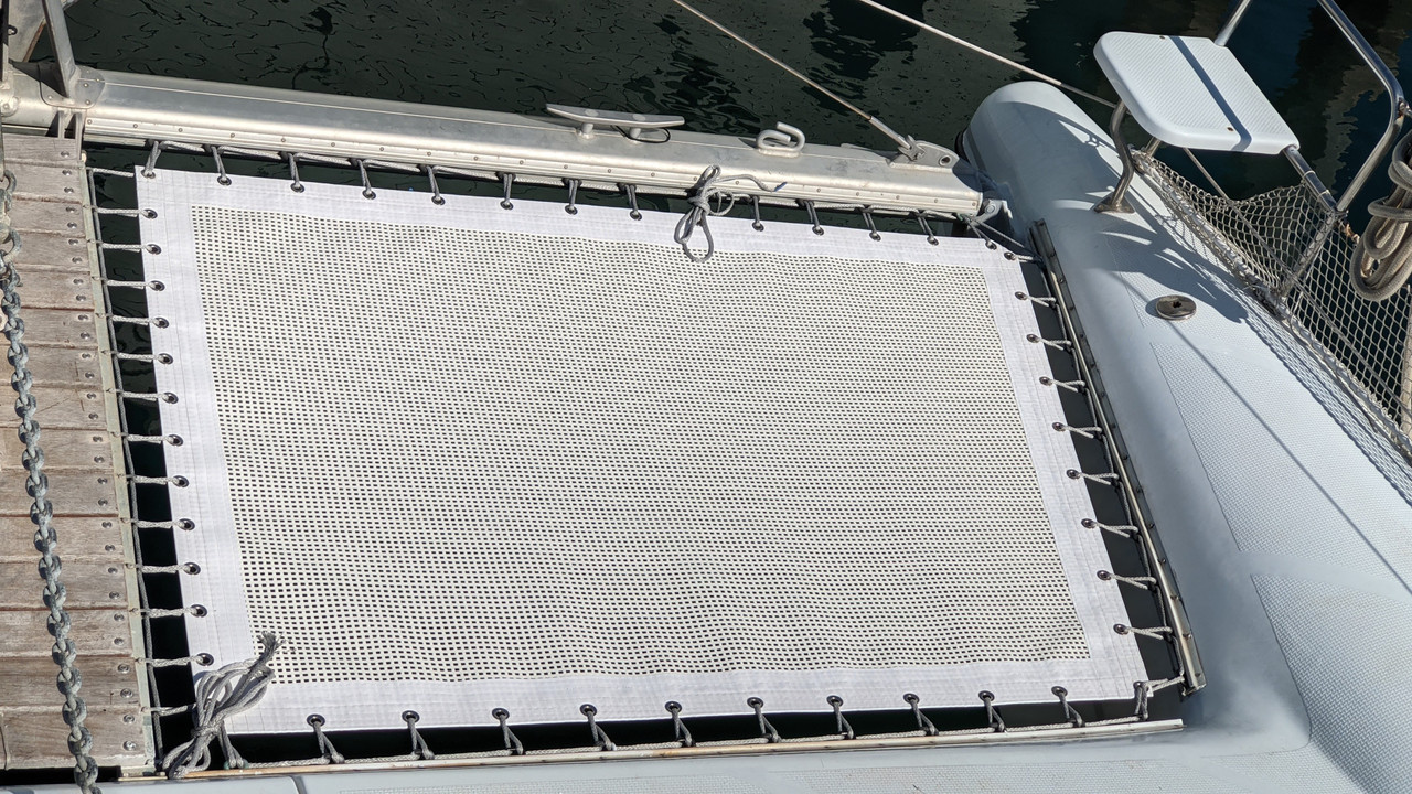 Wildcat 350 MK.III cruising catamaran 2 piece trampoline set made by skilled artisans in the USA at SLO Sail and Canvas. Constructed from top-notch Ferrari 492 architectural grade mesh, with your choice of grommets, and your choice of thread type. 