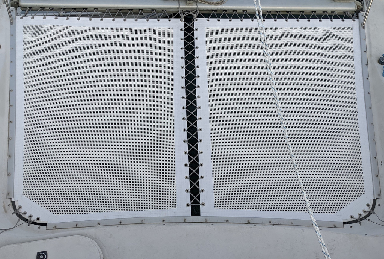 PDQ 32 cruising catamaran 2 piece trampoline set made by skilled artisans in the USA at SLO Sail and Canvas. Constructed from top-notch Ferrari 492 architectural grade mesh, with your choice of grommet type, and your choice of thread type. 