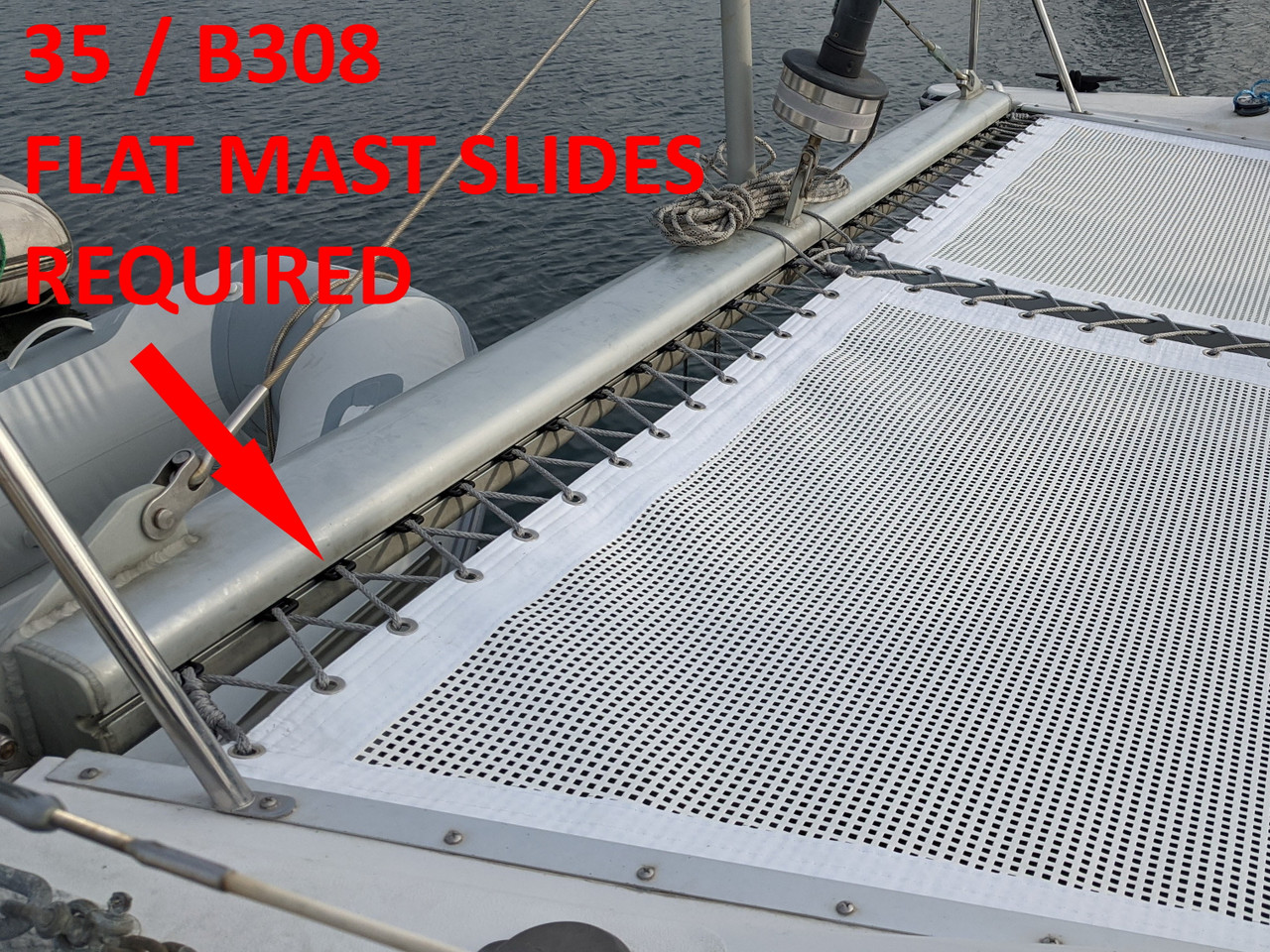 The redesigned PDQ 32 2pc Trampoline by SLO Sail and Canvas has omitted the OEM 3pc PDQ 32's forward "lacing strip" with grommets. To lace the SLO Sail and Canvas 2pc trampoline to your PDQ 32's forward crossbar you will need 35 / B308 Flat Mast Slides.