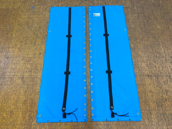 2pc Trampoline to fit a Hobie Getaway catamaran made in America by skilled artisans at SLO Sail and Canvas. 12” X 12” halyard pocket, included. Hand pounded #4 brass spur grommets. Adjustable hiking straps made of 3” Polypropylene webbing. Shown in Textilene 90 Lake Blue premium mesh. Optional Upgrade: Zipper Pocket shown.
