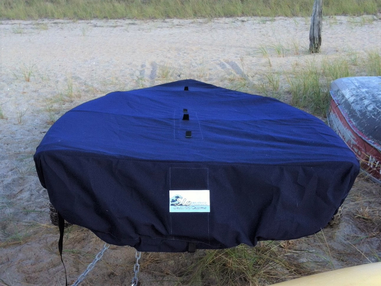 Reinforcements positioned over blocks and cleats prevent chafing. Webbing loops are sewn around the perimeter of our top covers allowing your cover to be tied to your boat. 