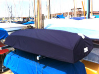 Naples Sabot Sailboat Hull Cover made in America by skilled artisans at SLO Sail and Canvas. 1/4" shockcord is built into cover to secure your cover tightly around the boat's rubrail. All of our covers are patterned from the actual boats they are designed to fit. This make for a better, higher quality product.
