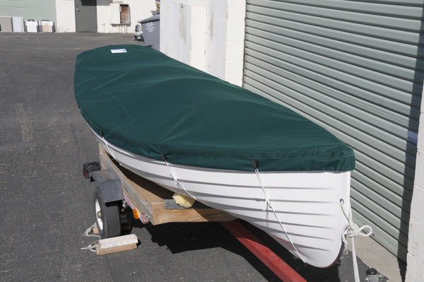 Whitehall Spirit 14 by Gig Harbor Boat Works Top Cover made in America by skilled artisans at SLO Sail and Canvas. All of our covers are patterned from the actual boats they are designed to fit. This make for a better, higher quality product.