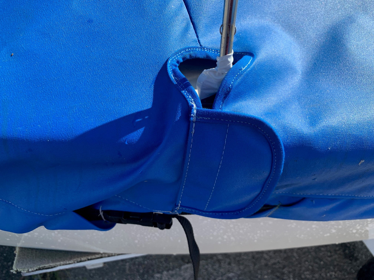 SLO Sail and Canvas'Blue Jay Mast Up Peaked Cover has openings for forestays and shrouds with a velcro closure flap. 