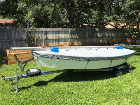 Blue Jay Sailboat Hull Cover made in America by skilled artisans at SLO Sail and Canvas. 1/4" shockcord is built into cover to secure your cover tightly around the boat's rubrail. Web Loops allow you to “tent” your cover up to prevent pooling of water. 

