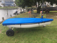 Sailboat Mast Up Flat Mooring Cover made in America by skilled artisans at SLO Sail and Canvas. Shown in Sunbrella Pacific Blue.
