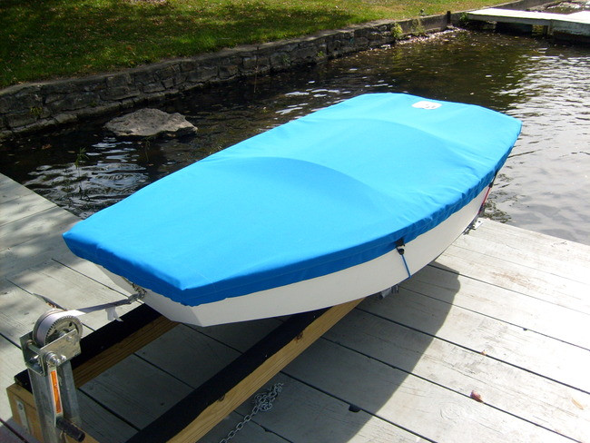 1/4" shockcord is built into cover to secure your cover tightly around the boat's rubrail. 
