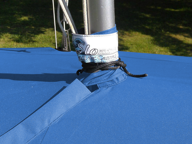 Vanguard 420 Mooring Cover by SLO Sail and Canvas. A mast collar and perfectly placed shroud cutouts fit tightly around your boat’s rigging. 

