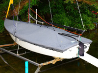 Holder 14 Sailboat Mast Up Flat Cover made in America by skilled artisans at SLO Sail and Canvas. Cover shown in Top Gun Sea Gull Gray. Available in 3 fabrics and many color choices.


