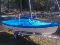 Sailboat Hull Cover made in America by skilled artisans at SLO Sail and Canvas. Cover shown in Sunbrella Pacific Blue. Available in 3 fabrics and many color choices.
