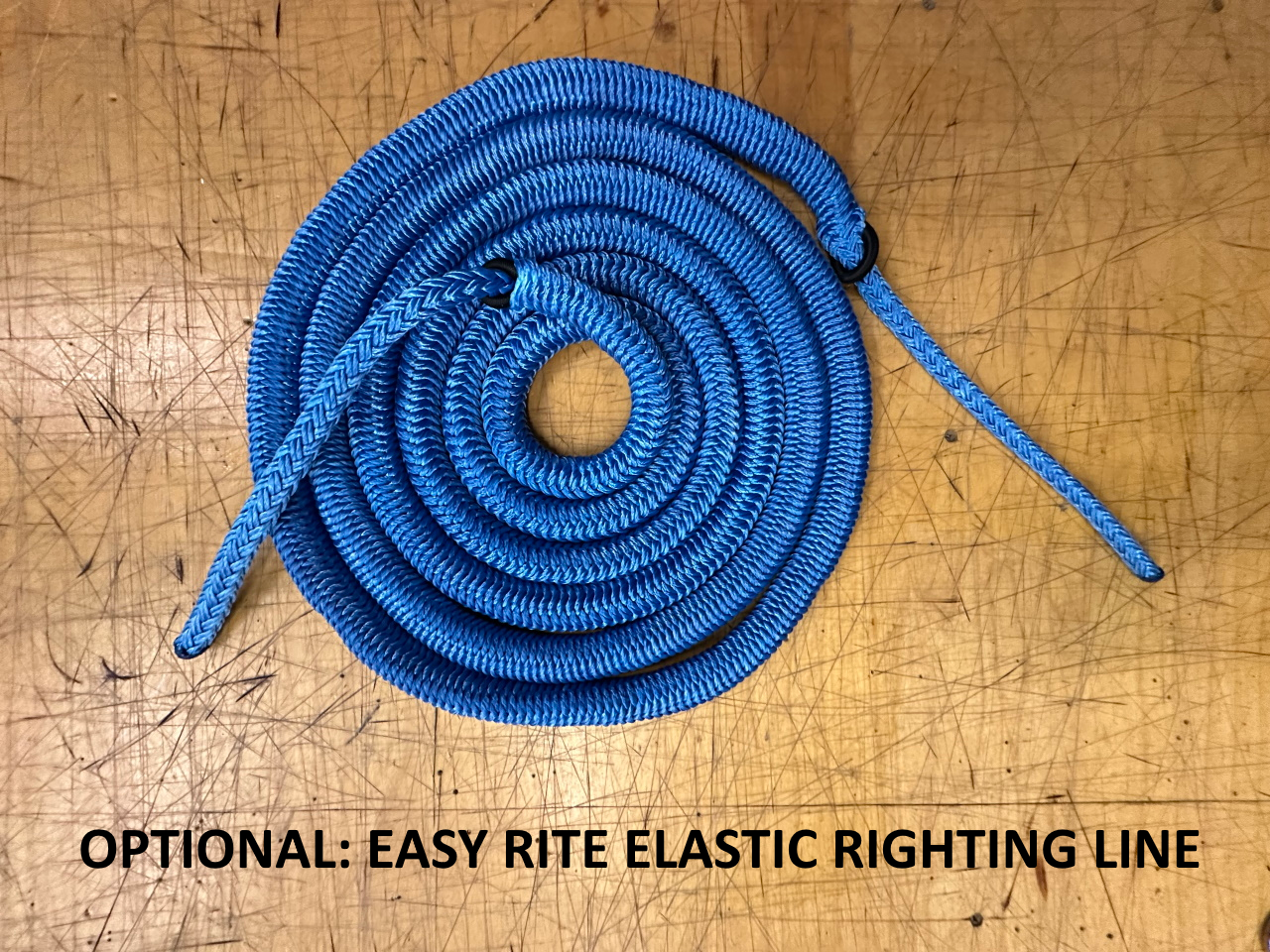 Optional Upgrade: Add an "Easy Rite" Righting Line. This upgrade replaces the standard high quality double braid righting line with a handy & useful hollow-core line stuffed with tough & durable shock cord. When routed around the perimeter of your trampoline area, the Easy Rite remains compressed and in place. When you capsize, the Easy Rite is always right where you need it to be. The elasticity allows you to pull the line away from your boat and right your boat without fear of entanglement. Also serves as a crew line for man overboard situations plus launching and landing. 