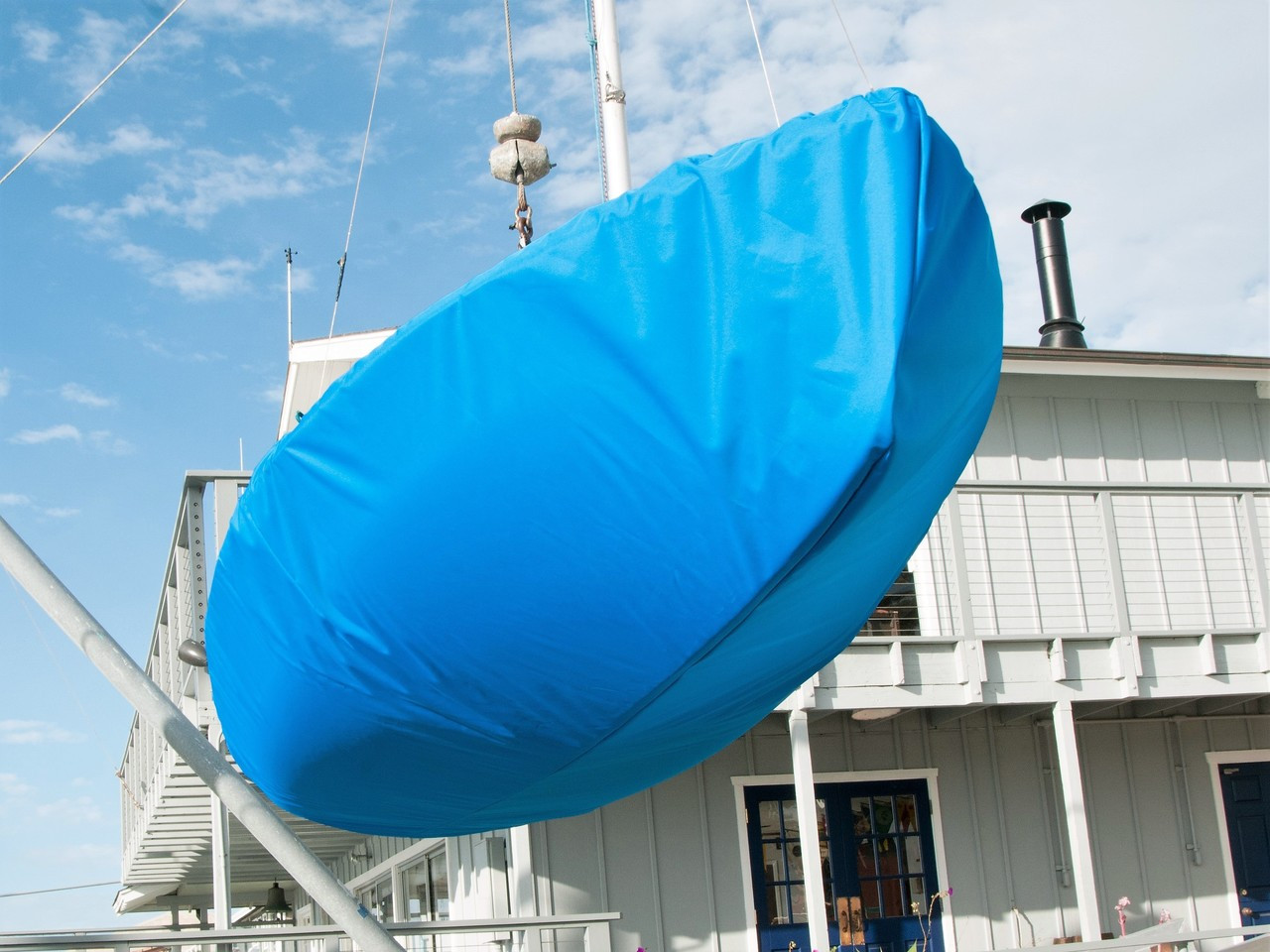 Hull Cover by SLO Sail and Canvas. Shown in Top Gun Caribbean Blue. 