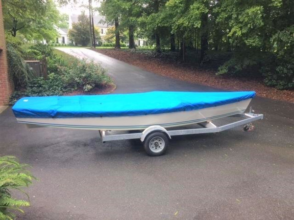 Sailboat Hull Cover made in America by skilled artisans at SLO Sail and Canvas. Cover shown in Top Gun Caribbean Blue. Available in 3 fabrics and many color choices.
