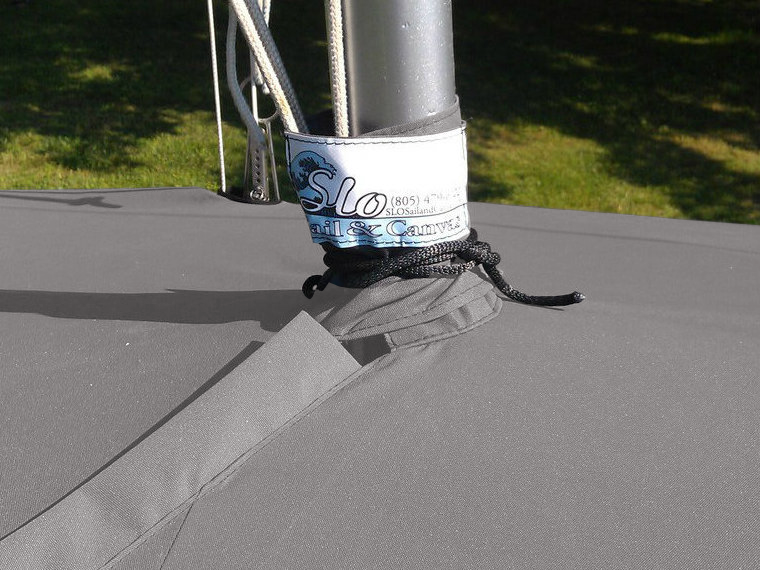 A mast collar and perfectly placed shroud cutouts fit tightly around your boats rigging. 