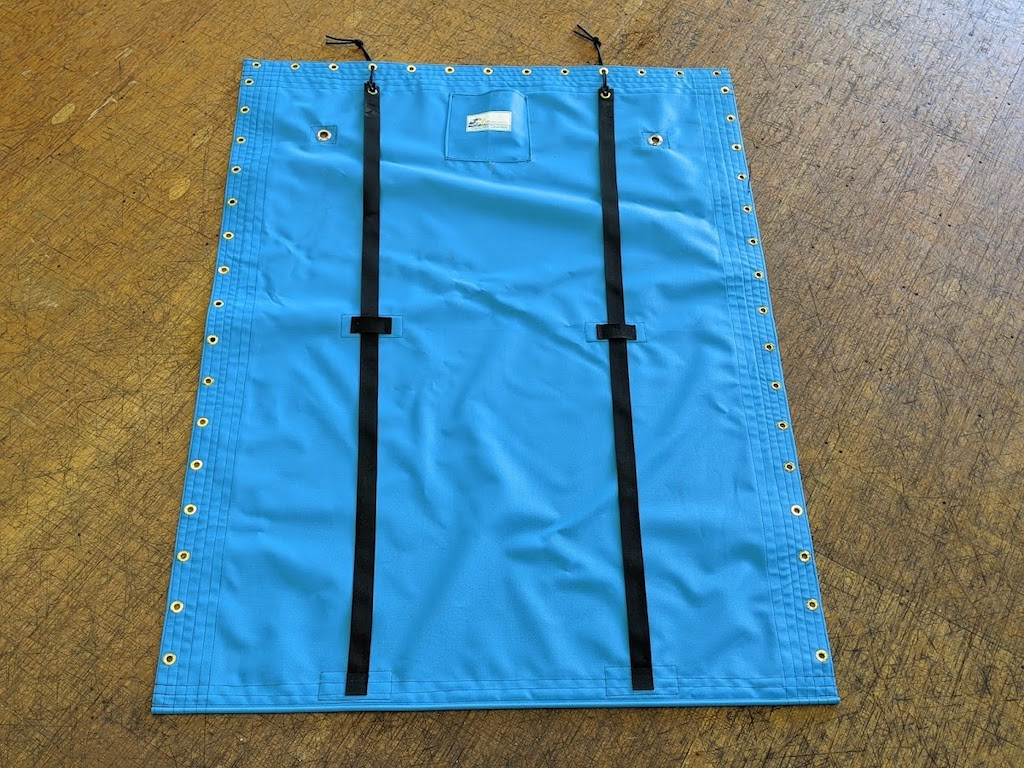 G-Cat 5.7 Aft Trampoline by SLO Sail and Canvas. Shown in Textilene 90 Lake Blue mesh. 