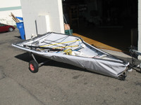 29'er Sailboat Hull Cover made in America by skilled artisans at SLO Sail and Canvas. Cover shown in SofTouch Silver Gray. Available in 4 fabrics and many color choices.
