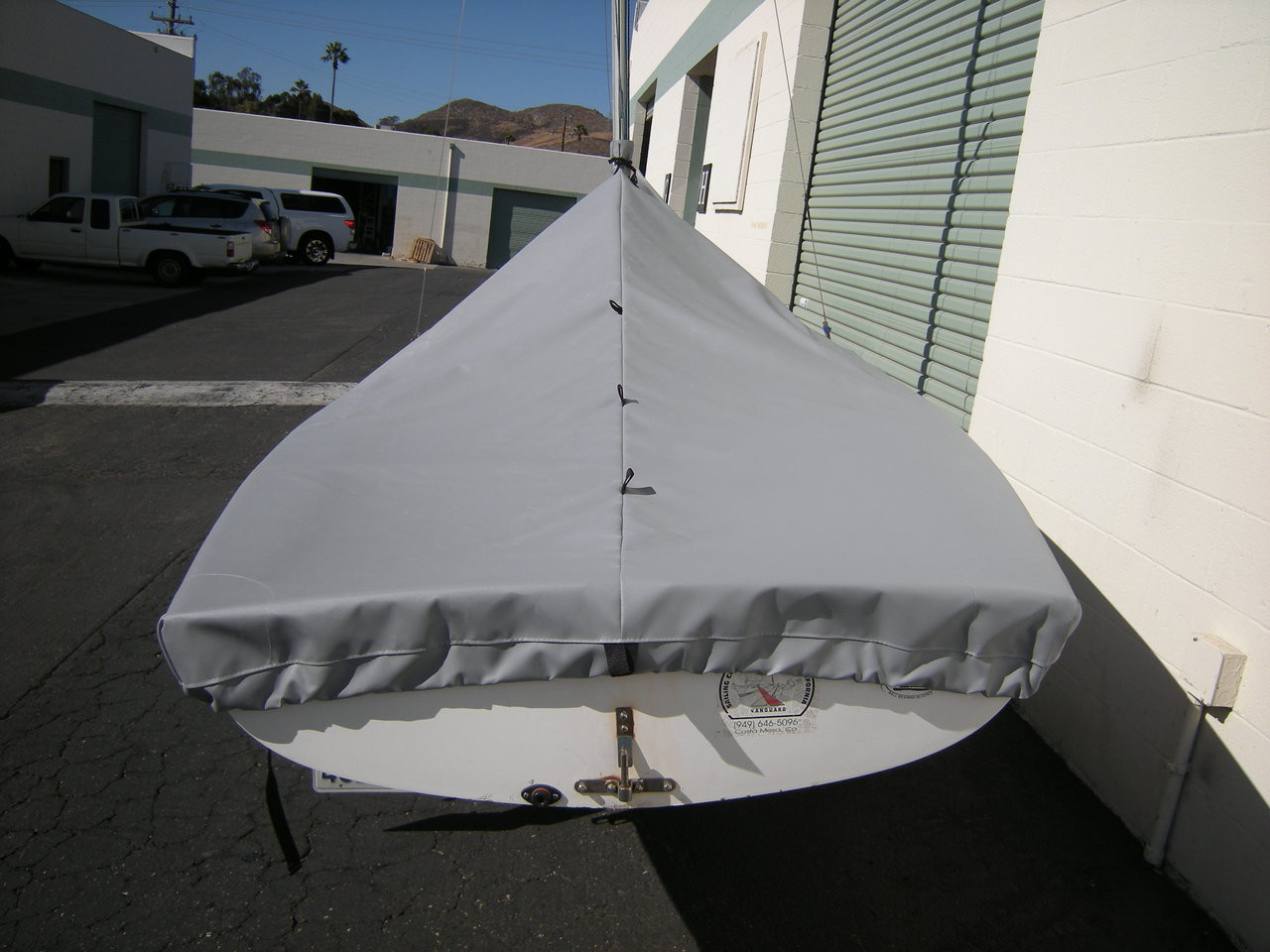 420 sailboat Mast Up Peaked Cover by SLO Sail and Canvas. Reinforcements positioned over blocks and cleats prevent chafing.

