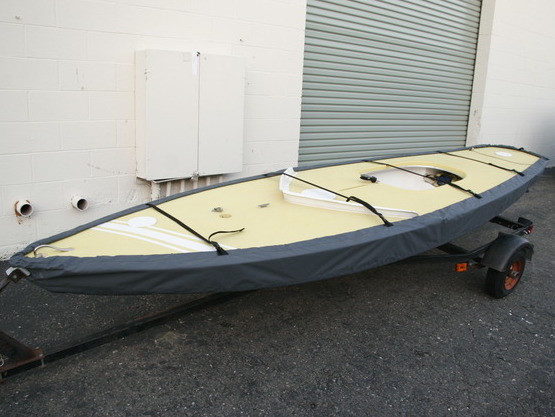 Scorpion Sailboat Hull Cover made in America by skilled artisans at SLO Sail and Canvas. Cover shown in Polyester Charcoal Gray. Available in 4 fabrics and many color choices.