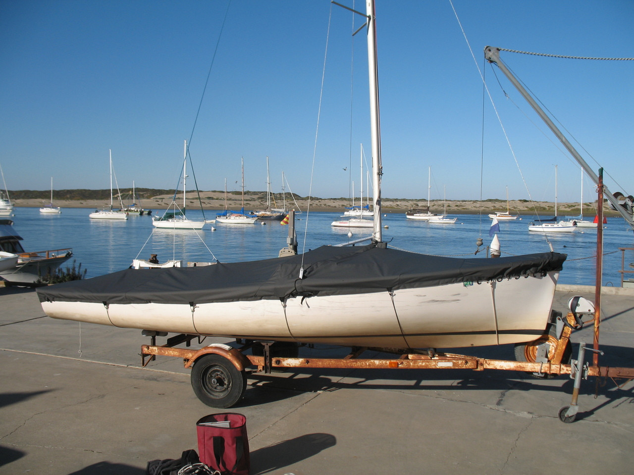 Daysailer Sailboat Mast Up Flat Boat Cover by SLO Sail and Canvas. Shown in Sunbrella Cadet Gray.