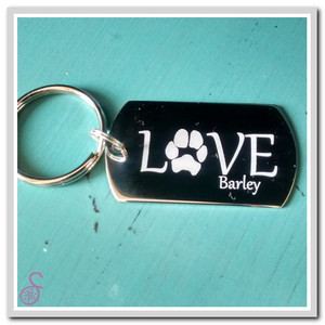 Stainless steel Double Love Pawprint Keychain. This is the front, the back is the same design with the second pet's paw and name