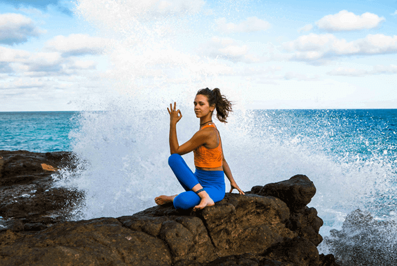 yoga on a rock