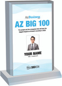 2025 AzBusiness  AZ Big 100 Acrylic Desktop Style F with photo
The photo on the plaque will be the one that appears in the magazine.  
(Photo here is an example - the photo and information will  be specific to you)