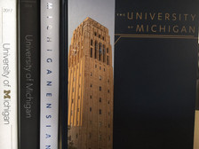 Save time and money by reserving your yearbooks for the next four years. The Freshman Four Pack delivers four consecutive volumes of the Michiganensian Yearbook, starting with the current year.

Photo depicts a sample package. Current offer starts with 2020–2021 Michiganensian.
