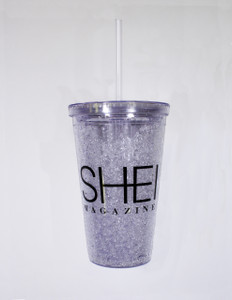 Clear plastic 16 oz. cup with straw and screw-top lid, printed with SHEI logo