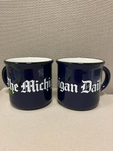 Enjoy your favorite coffee, tea, or hot cocoa in what will soon be your new favorite mug. The Michigan Daily mug is a dishwasher-safe, cobalt blue ceramic mug with white logo.