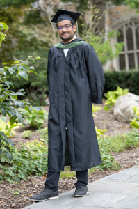 Photo depicts a sample master's degree graduation regalia package. 