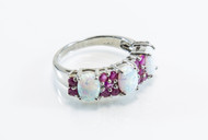 Lab-Created Opals Patterned With Natural Rubies. 